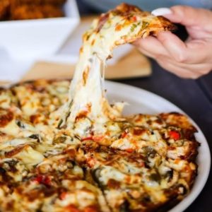 Brew Lounge Tygervalley | The Friends Sharing Deal,1 large Pizza, 12 Wingz and 2 Split Steak Sandwiches and A Hookah Pipe