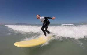 Cape Town Surf School | Conquer Waves With A Interactive Group Surf Lesson For 1 Incl Board and Wetsuit