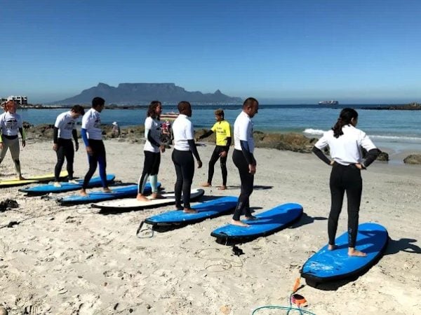 Cape Town Surf School | Conquer Waves With A Interactive Group Surf Lesson For 1 Incl Board and Wetsuit